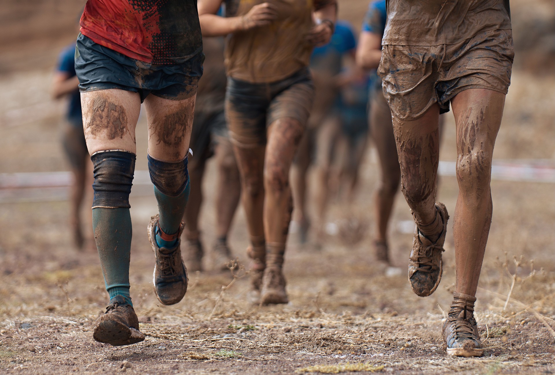 Group of participants in an obstacle course race running